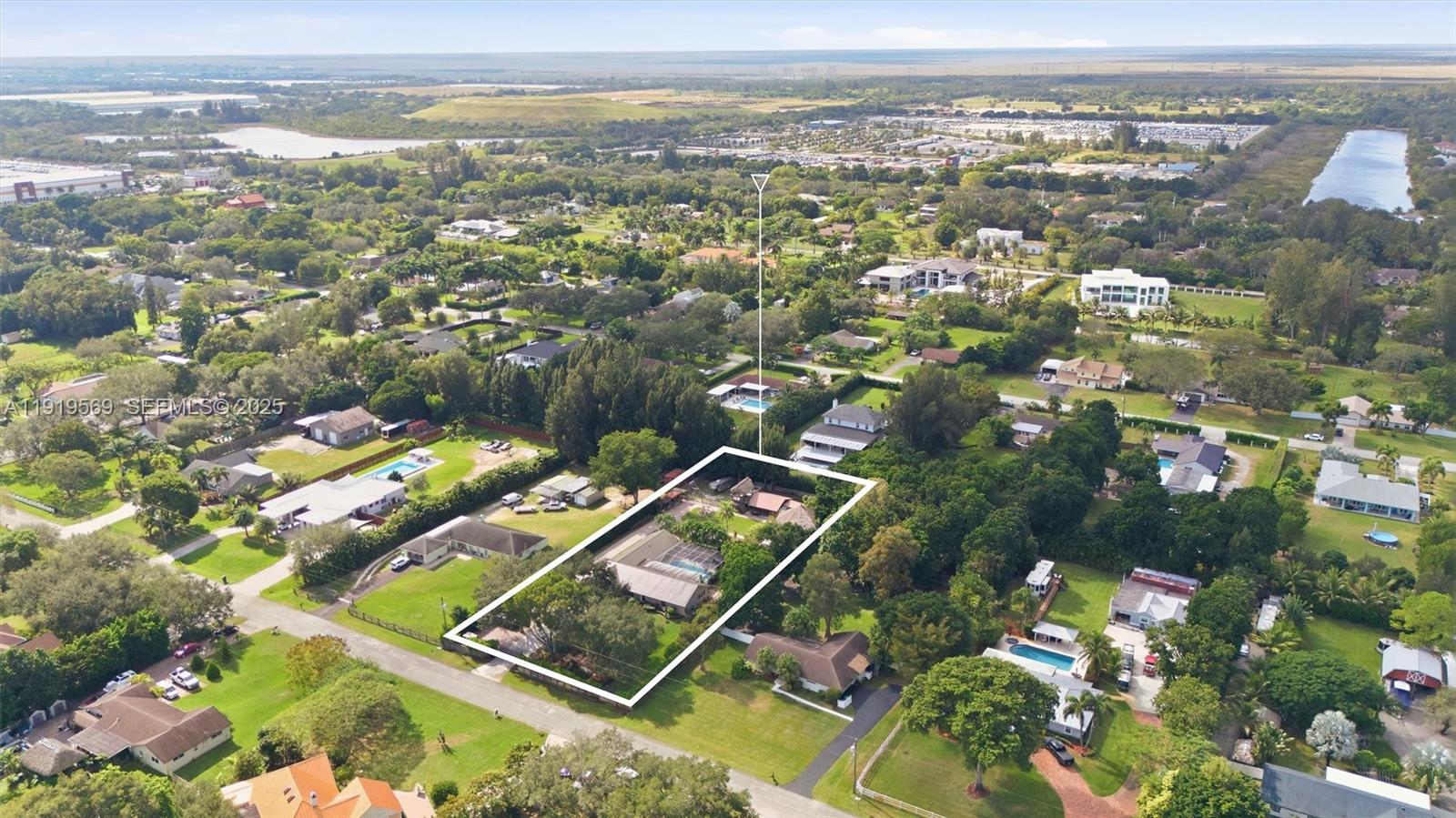 5601 Southwest 195th Terrace Southwest Ranches, FL 33332 - Photo 74 of 84 an aerial view of residential houses with outdoor space