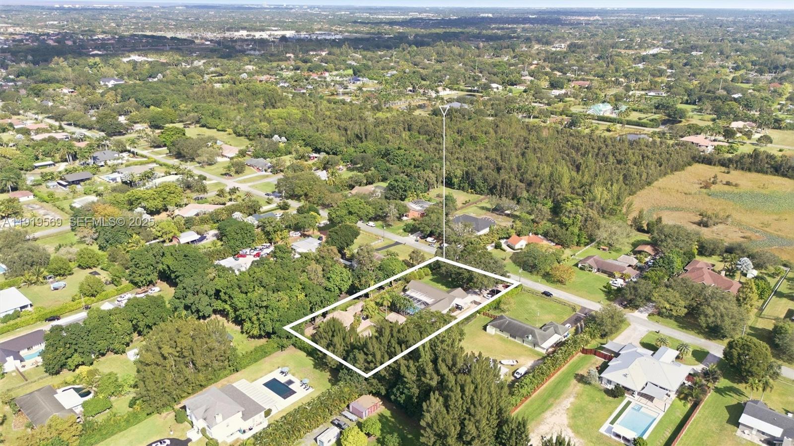5601 Southwest 195th Terrace Southwest Ranches, FL 33332 - Photo 78 of 84 an aerial view of residential houses with outdoor space