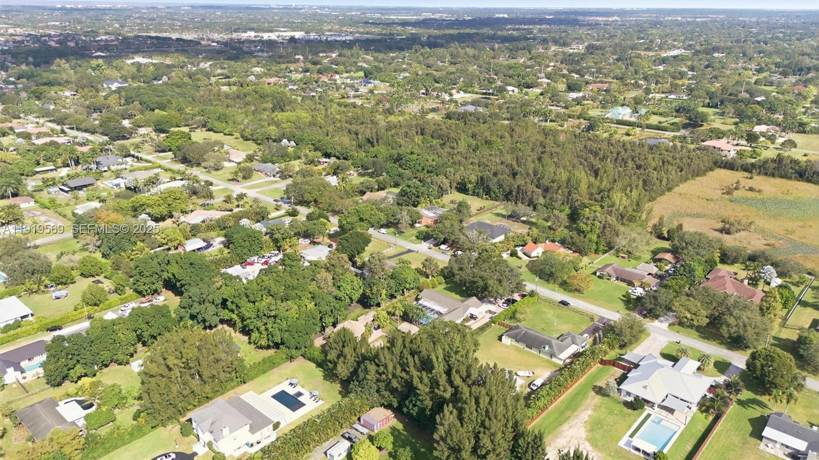 5601 Southwest 195th Terrace Southwest Ranches, FL 33332 - Photo 79 of 84 an aerial view of residential houses with outdoor space
