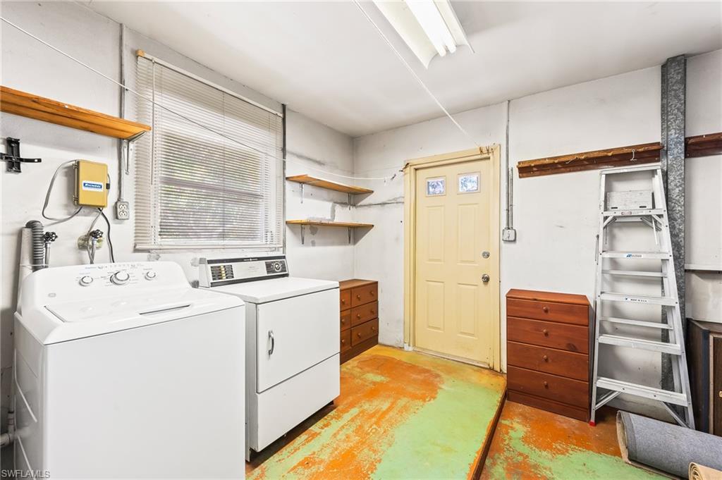 4815 Cortez Circle Naples, FL 34112 - Photo 26 of 31 a kitchen with a refrigerator and a stove