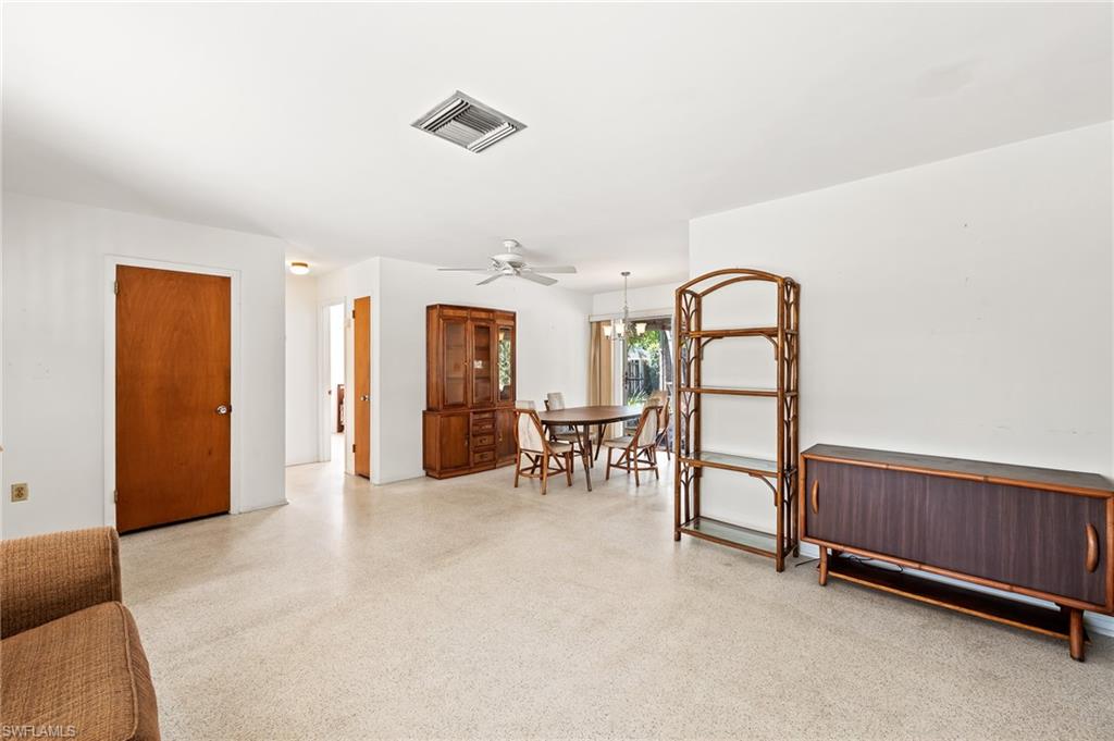 4815 Cortez Circle Naples, FL 34112 - Photo 9 of 31 a view of an empty room with window