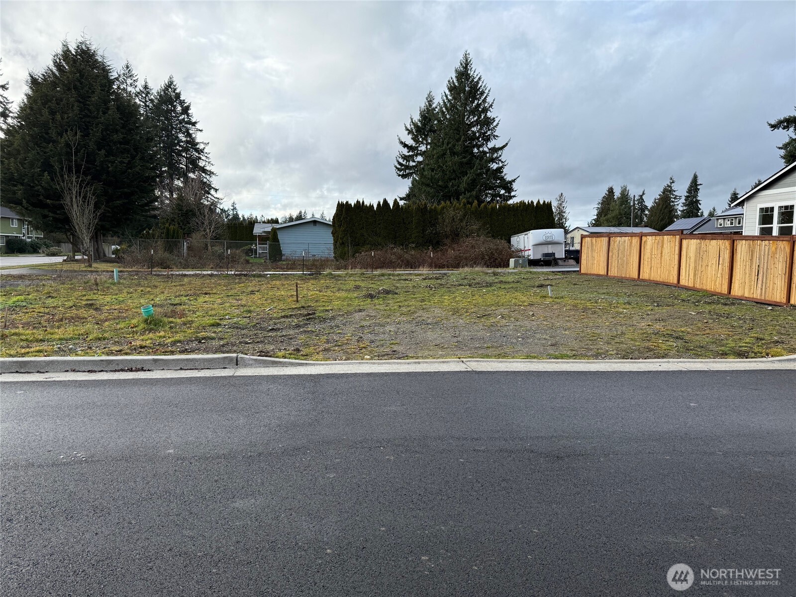 2223 124th Street Southeast Everett, WA 98208 - Photo 4 of 5 a view of a yard with an trees
