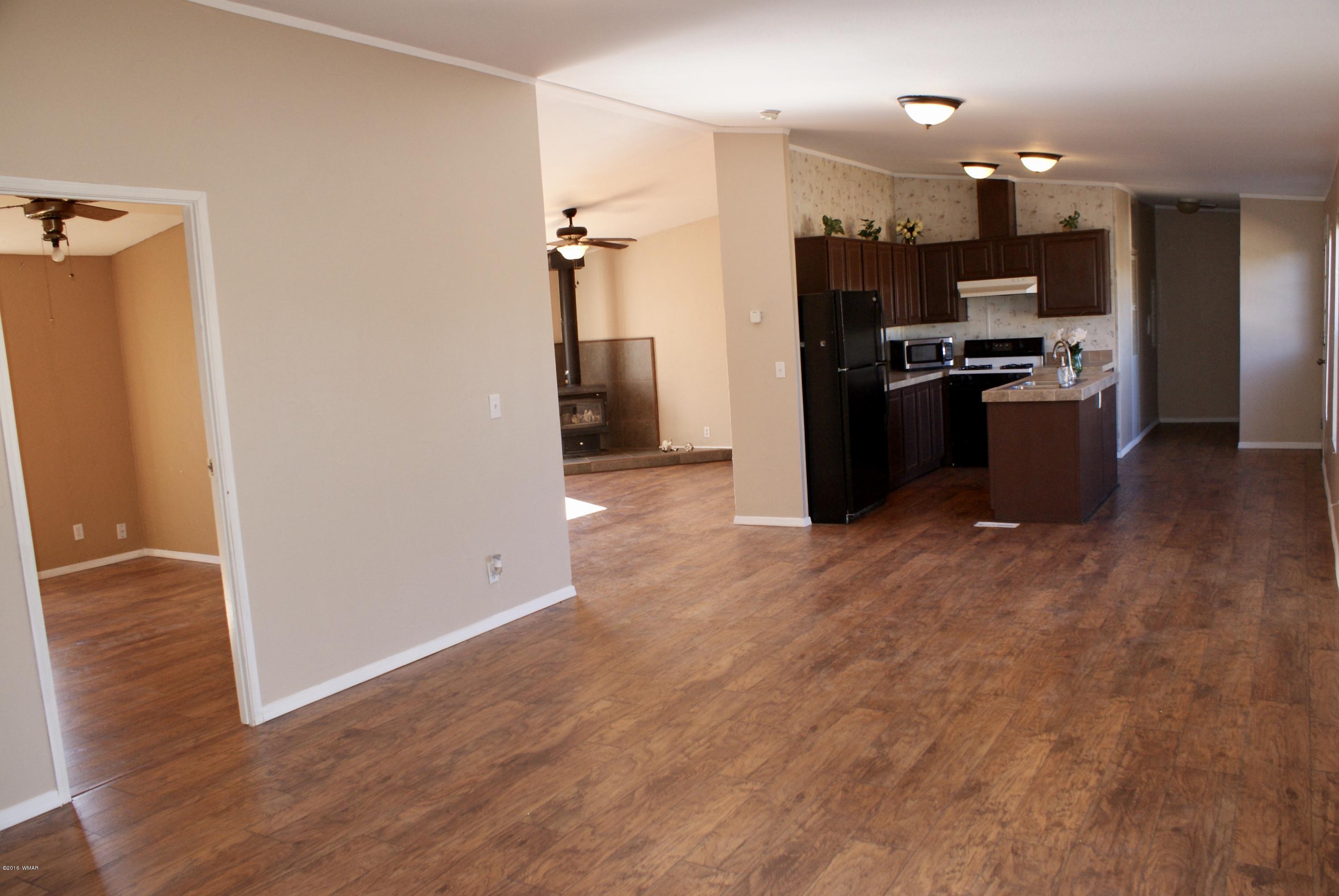 Lot 66 Antelope Vernon, AZ 85940 - Photo 1 of 17 a view of kitchen with refrigerator and window