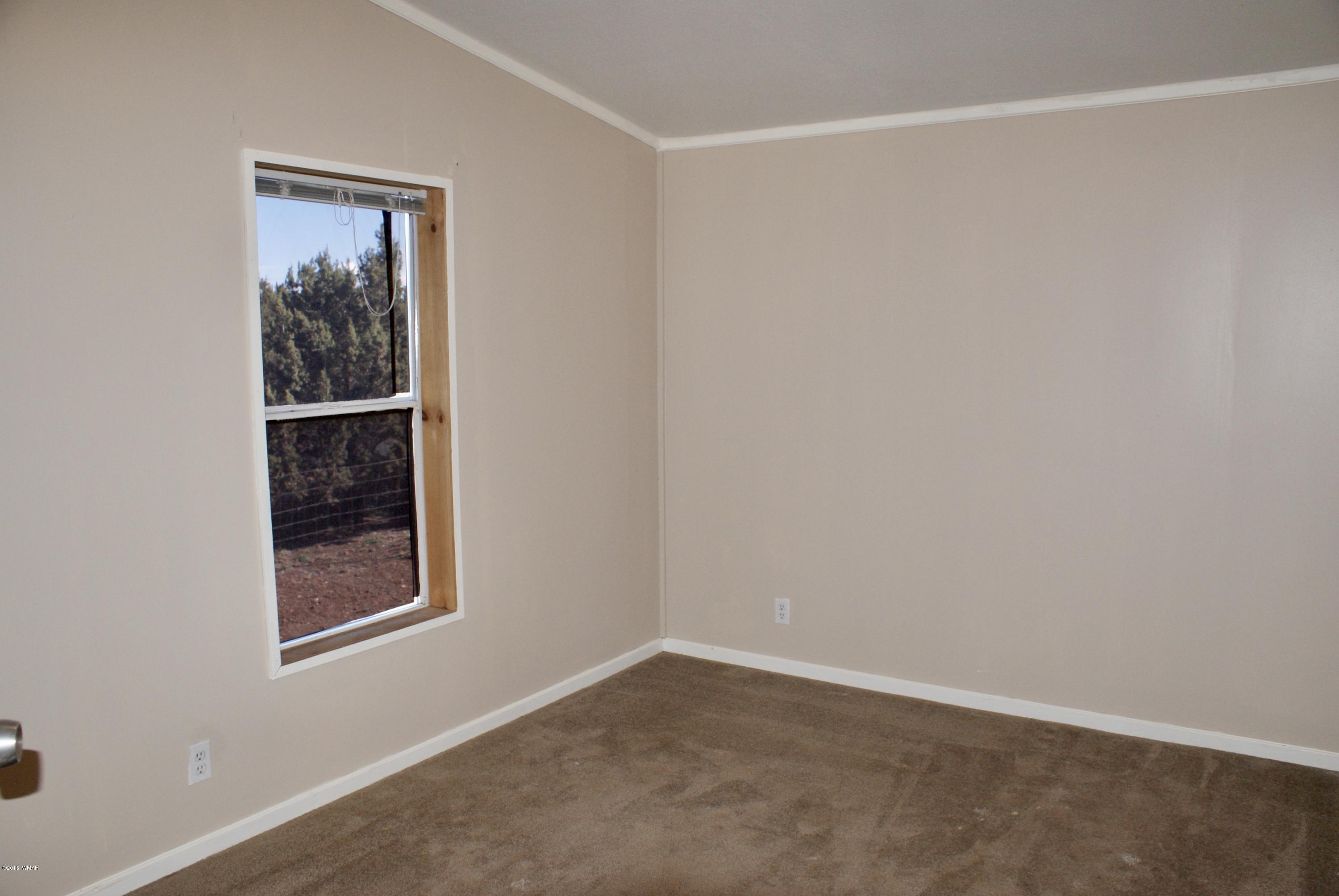 Lot 66 Antelope Vernon, AZ 85940 - Photo 12 of 17 an empty room with a window