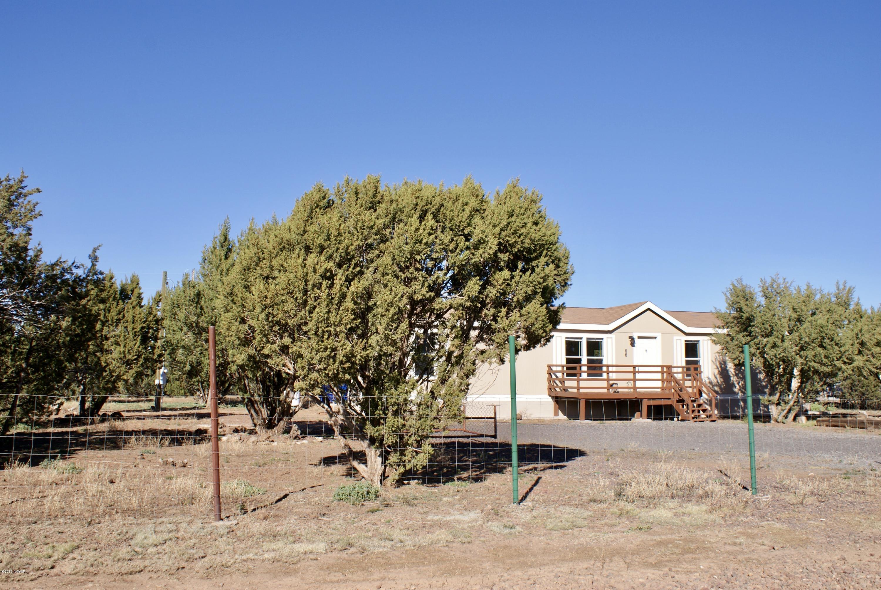 Lot 66 Antelope Vernon, AZ 85940 - Photo 15 of 17 a view of house with yard and covered with snow