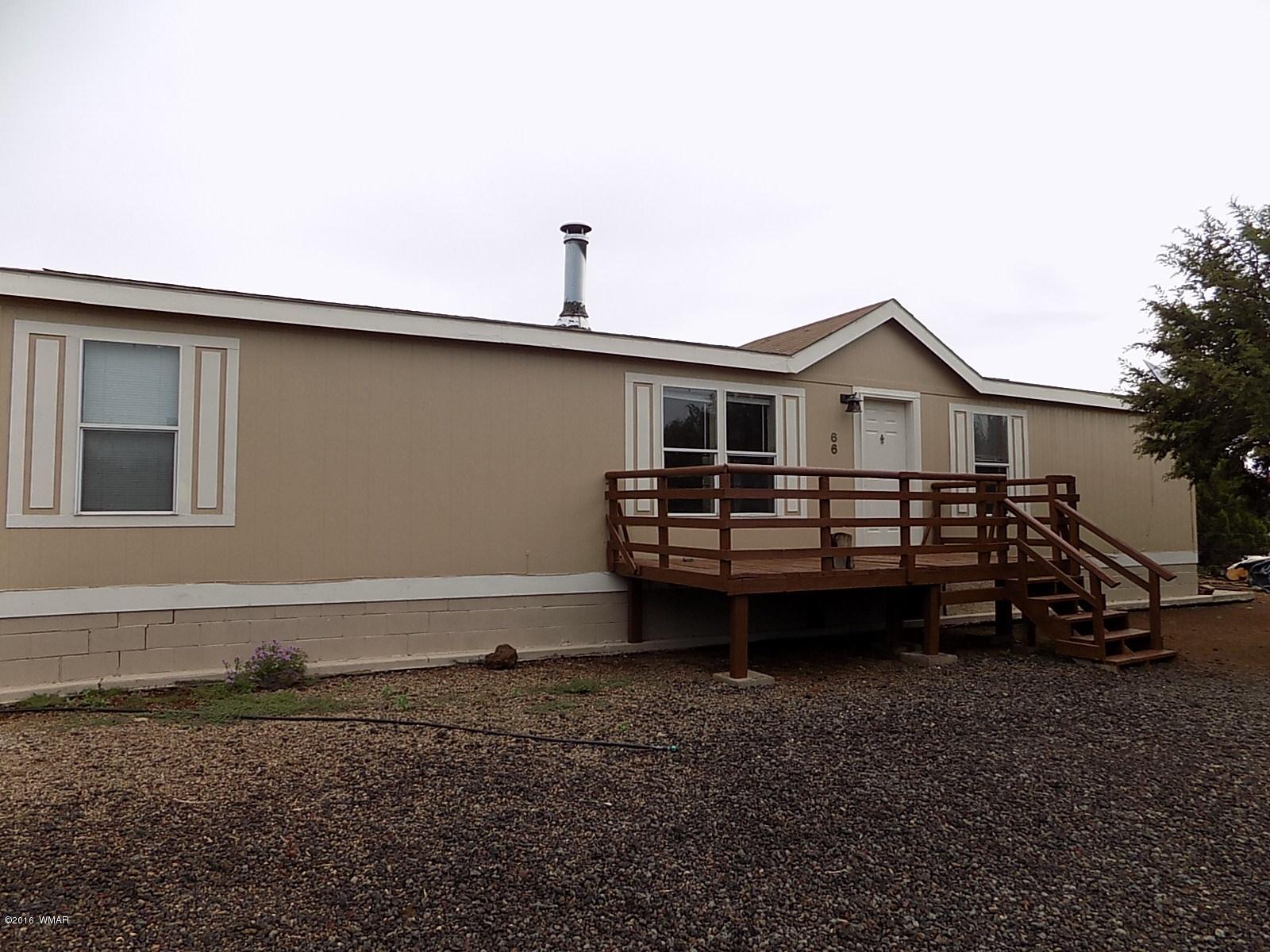 Lot 66 Antelope Vernon, AZ 85940 - Photo 16 of 17 a view of a house with a backyard and sitting area