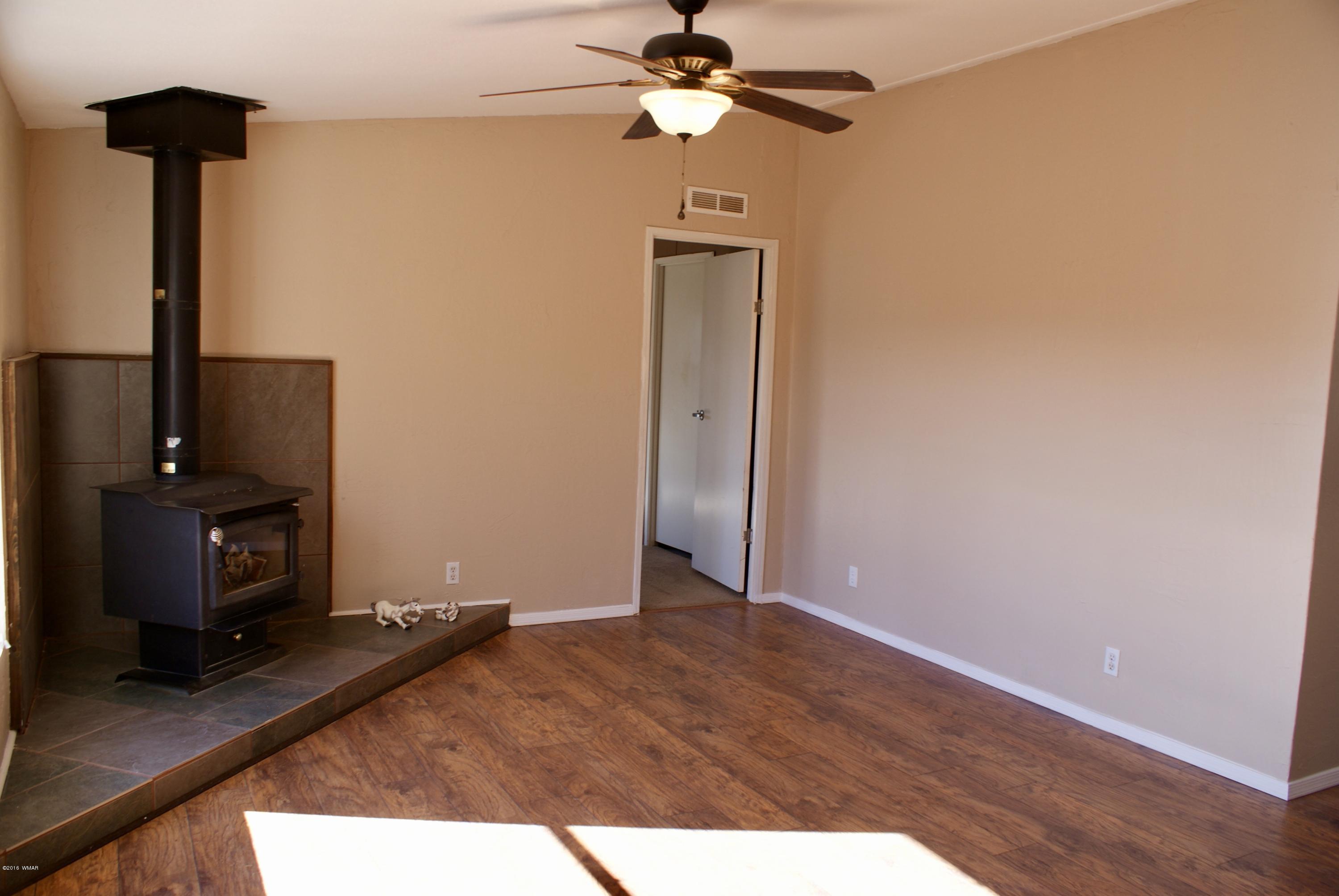 Lot 66 Antelope Vernon, AZ 85940 - Photo 2 of 17 a view of a workspace with furniture and a flat screen tv