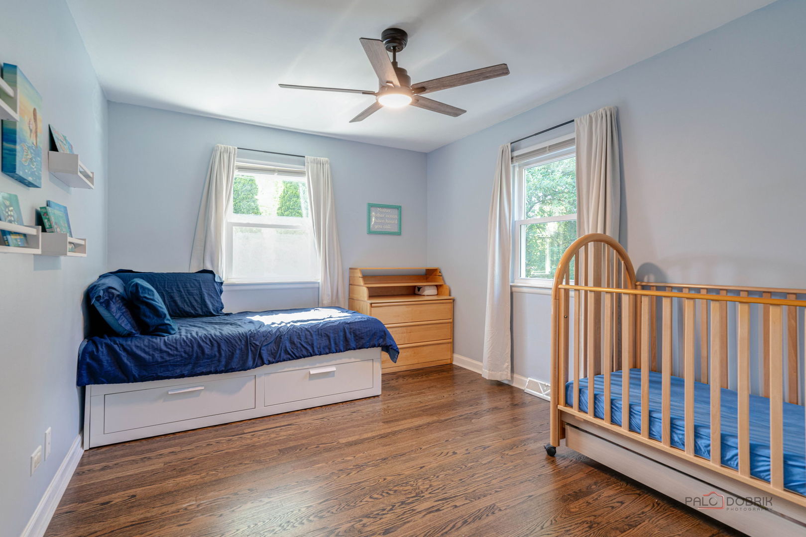 489 1st Street Antioch, IL 60002 - Photo 15 of 33 a living room with a bed furniture and a window