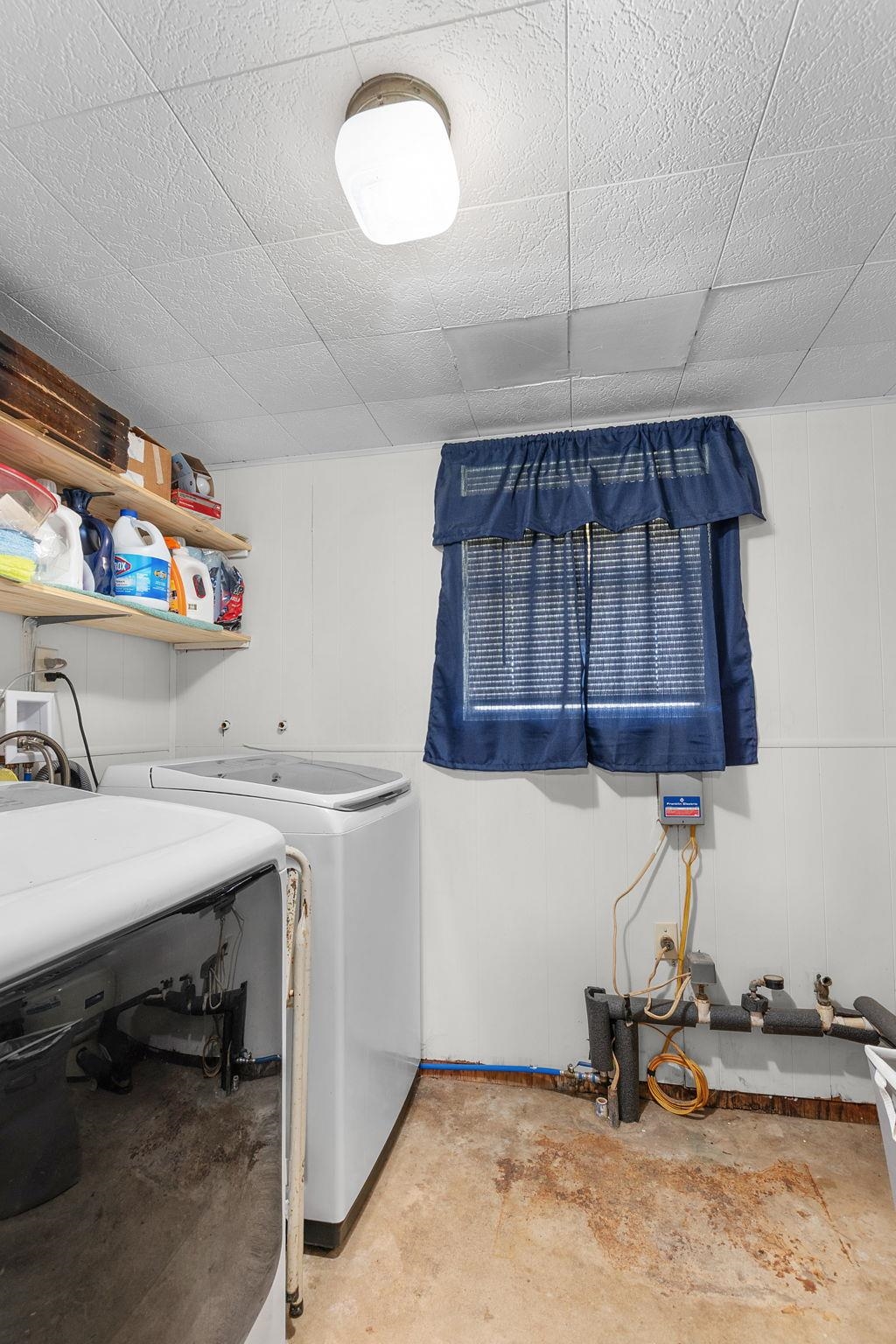 1365 Norma Tow, TX 78672 - Photo 34 of 45 a room with a sink cabinets and utility