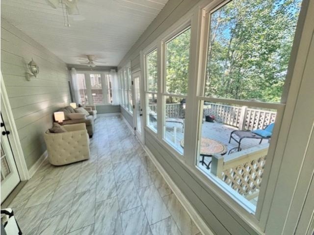 31 Tamara Trail Iuka, MS 38852 - Photo 13 of 23 a view of a living room and floor to ceiling window with wooden floor
