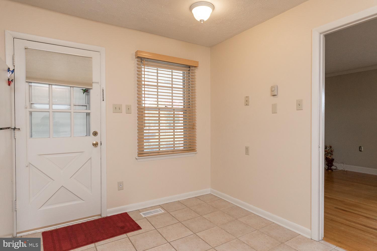 103 Frederick Road Stephens City, VA 22655 - Photo 21 of 40 Side door off car port and into Kitchen