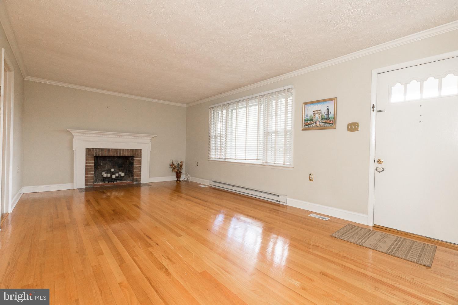 103 Frederick Road Stephens City, VA 22655 - Photo 9 of 40 Spacious living room with wood burning fireplace