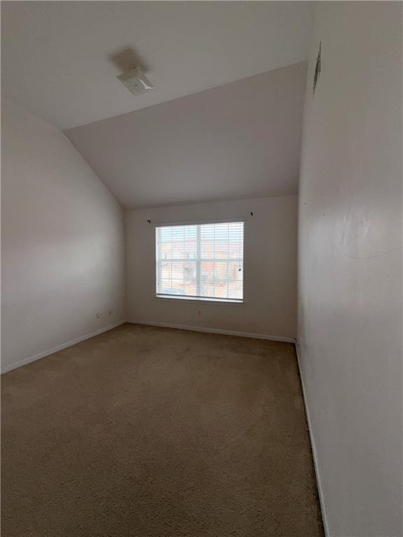 620 Superior Way Fairburn, GA 30213 - Photo 19 of 27 an empty room with a window