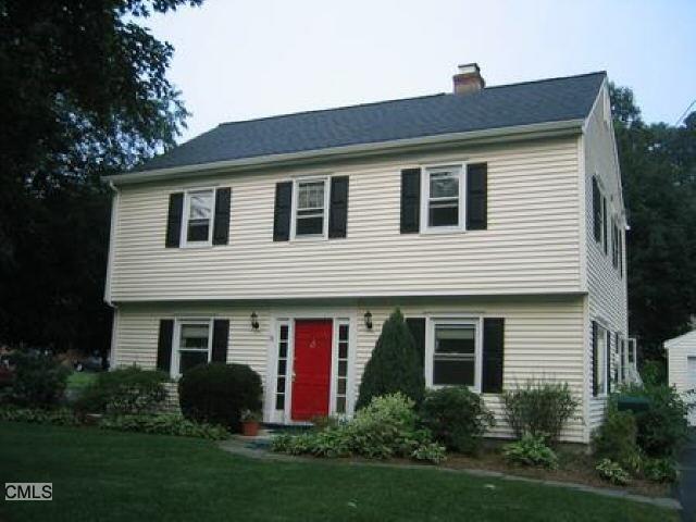 31 Shadow Ridge Road Stamford, CT 06905 - Photo 1 of 1 a front view of house with yard and green space