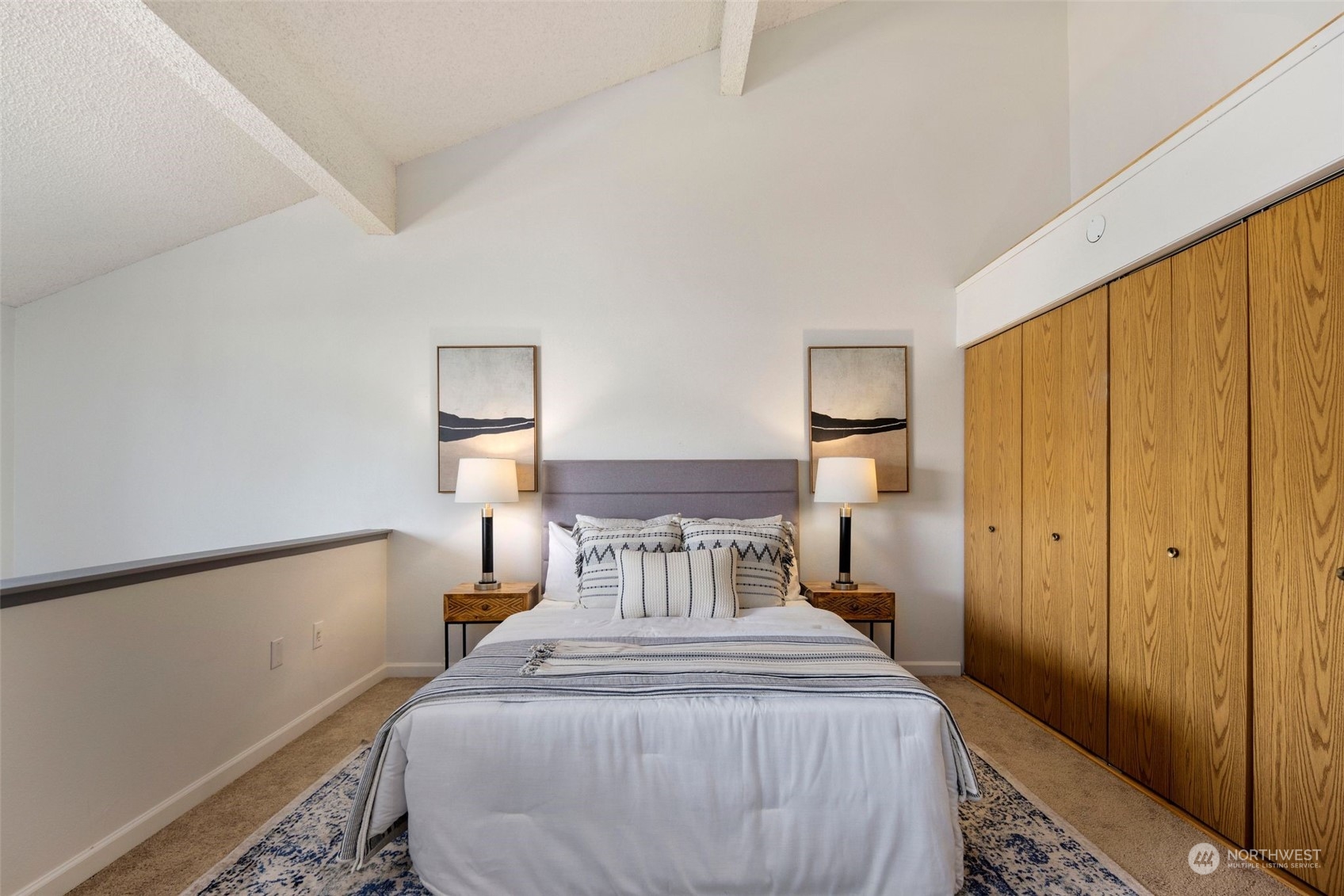 21658 14th Avenue South, Unit A10 Des Moines, WA 98198 - Photo 14 of 39 a bedroom with a bed and a window