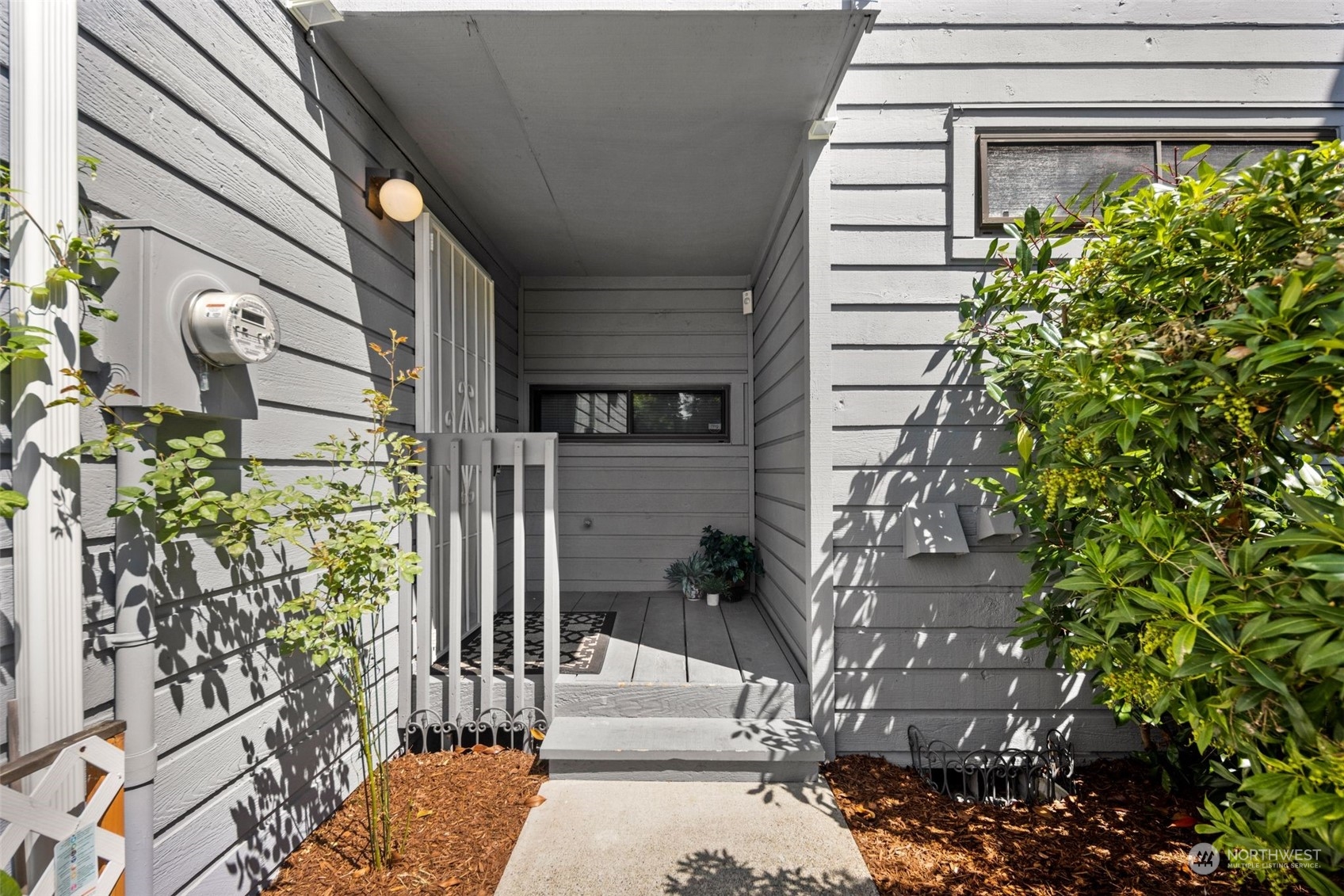 21658 14th Avenue South, Unit A10 Des Moines, WA 98198 - Photo 20 of 39 a view of path along with potted plants