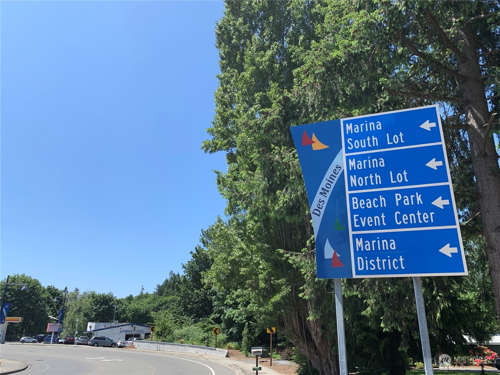 21658 14th Avenue South, Unit A10 Des Moines, WA 98198 - Photo 25 of 39 a sign on the side of a road