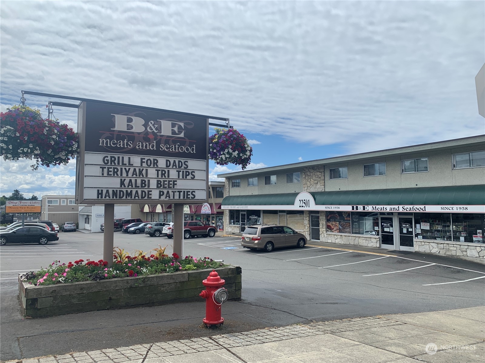 21658 14th Avenue South, Unit A10 Des Moines, WA 98198 - Photo 31 of 39 a car parked in front of a building