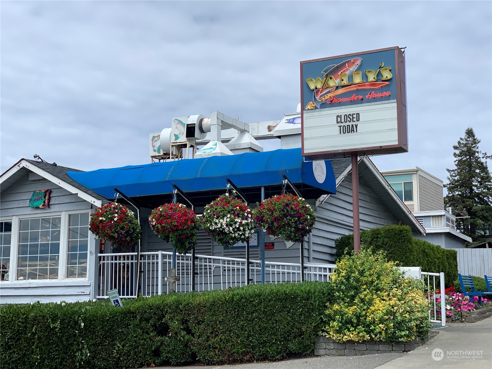 21658 14th Avenue South, Unit A10 Des Moines, WA 98198 - Photo 38 of 39 a view of a chairs and table in a backyard