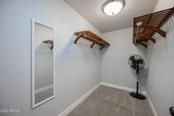 a view of a room with rack on the wall