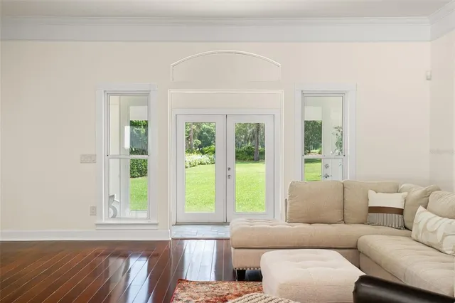 a view of a room with a large window