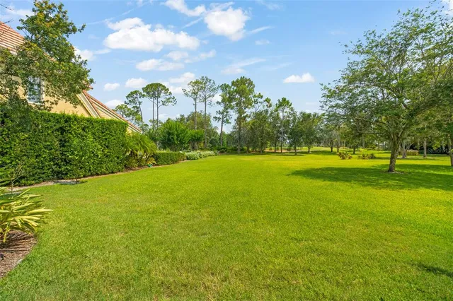 a spacious bathroom with a double vanity sink double mirror and bathtub