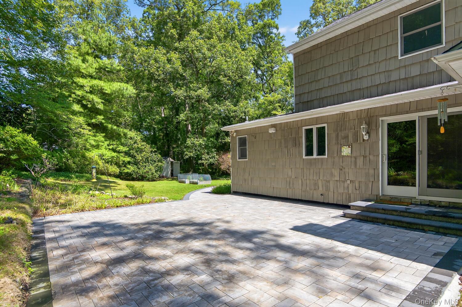 43 Edcris Lane Huntington, NY 11724 - Photo 4 of 37 a view of backyard with small cabin