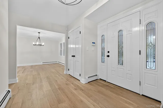 a view of a bathroom with wooden floor