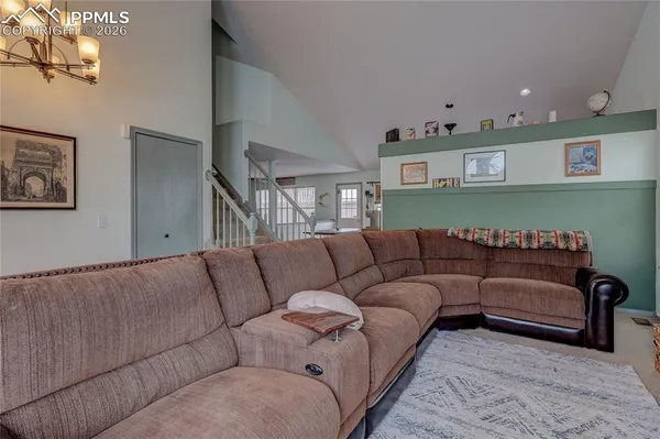 a living room with furniture and a couch