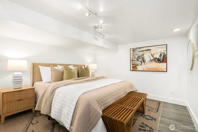 a bedroom with a bed and a closet