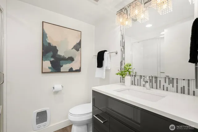 a view of a hallway with washer and dryer