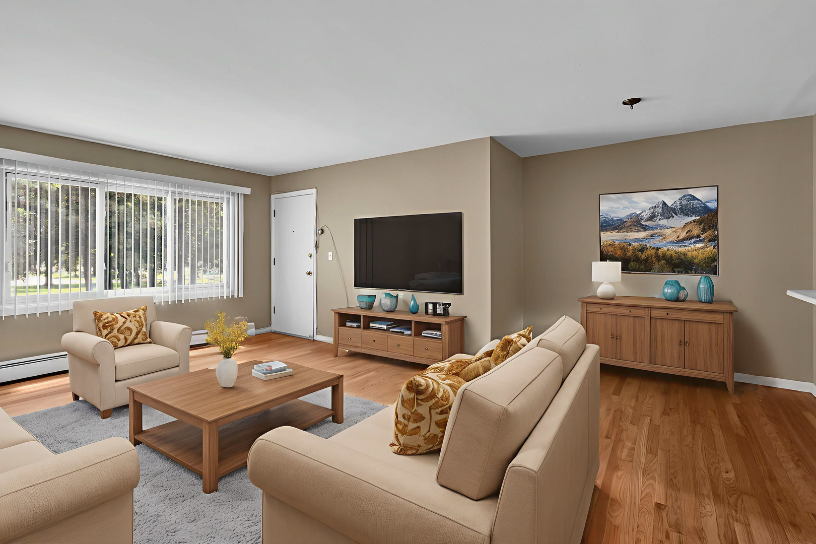 7952 Madison Street, Unit 2E River Forest, IL 60305 - Photo 2 of 25 a living room with furniture and a flat screen tv