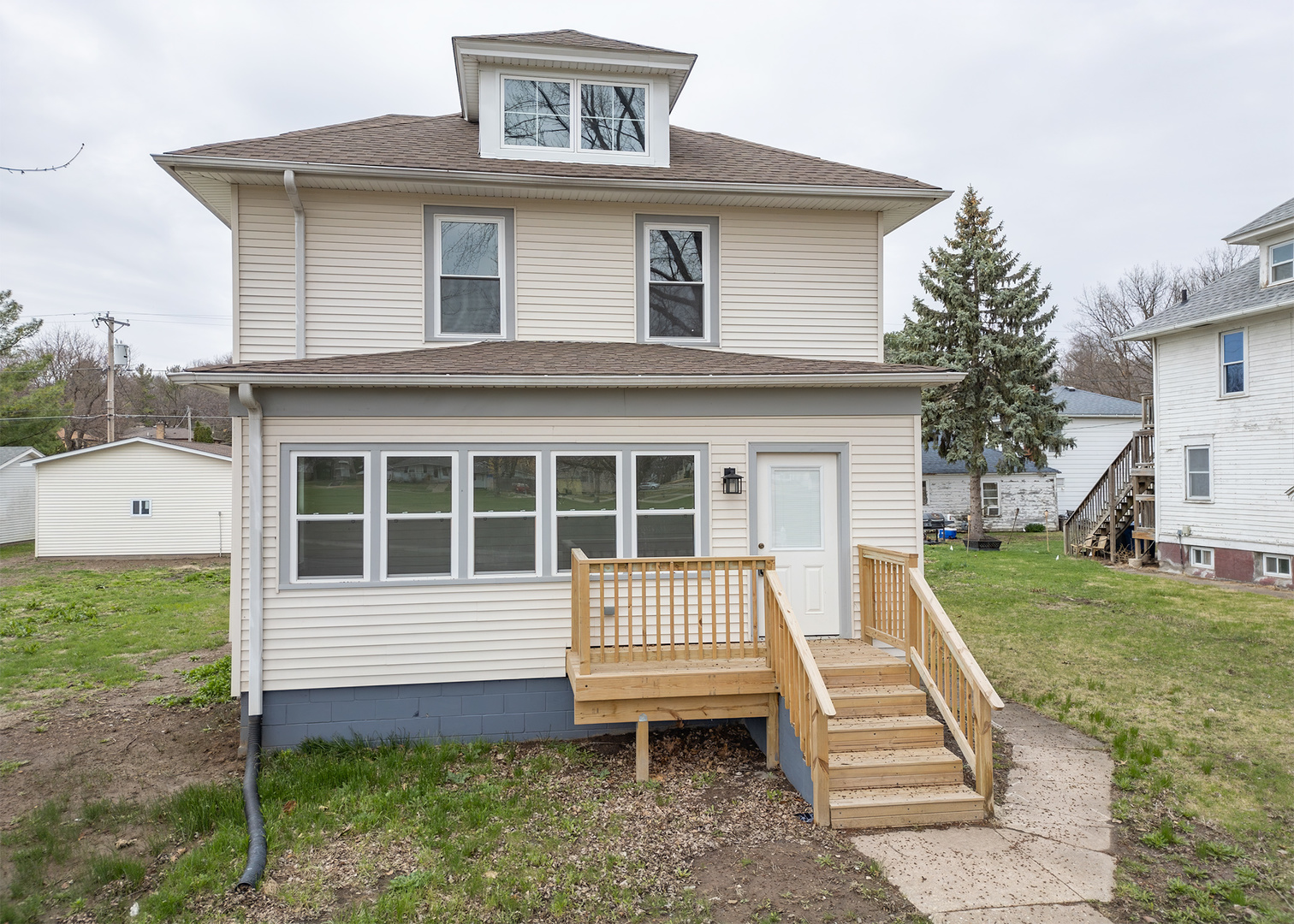 a house view with a garden space