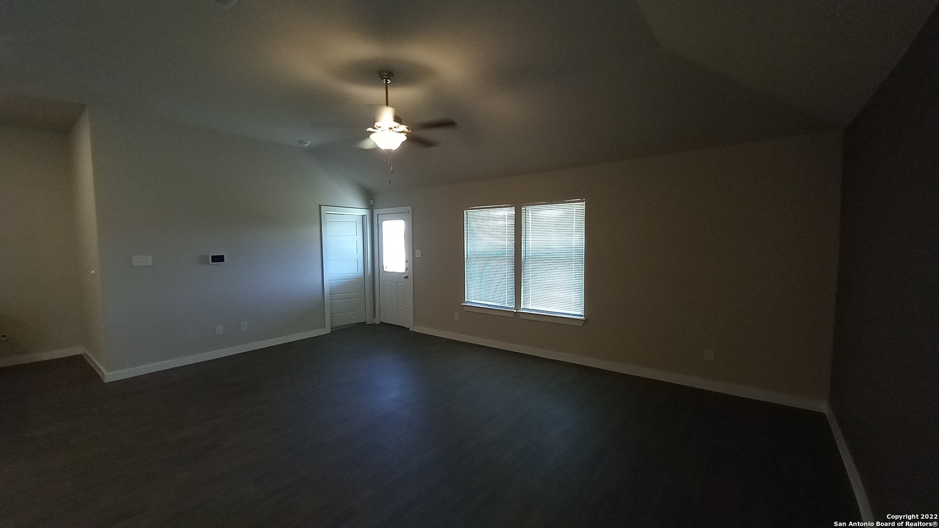 10571 Pablo Way Converse, TX 78109 - Photo 15 of 48 a view of wooden floor and windows in a room