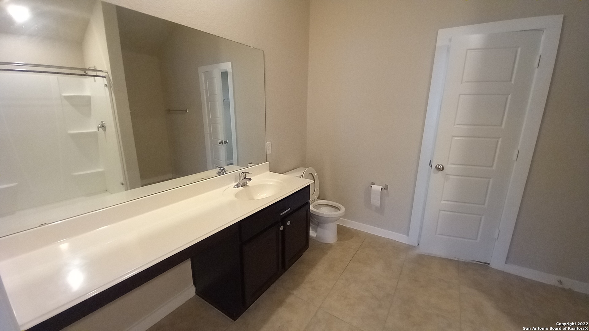 10571 Pablo Way Converse, TX 78109 - Photo 29 of 48 a bathroom with a sink and a mirror
