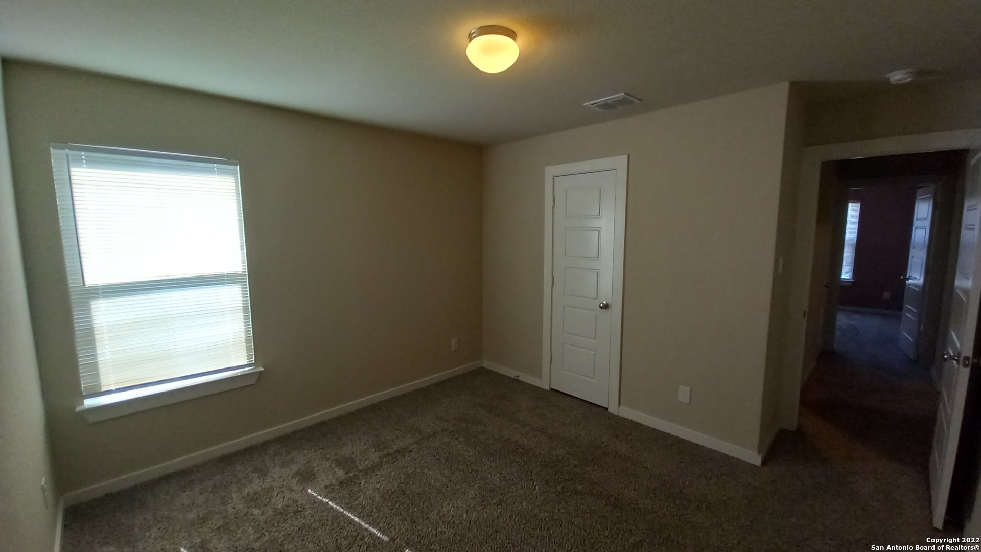 10571 Pablo Way Converse, TX 78109 - Photo 34 of 48 an empty room with a window