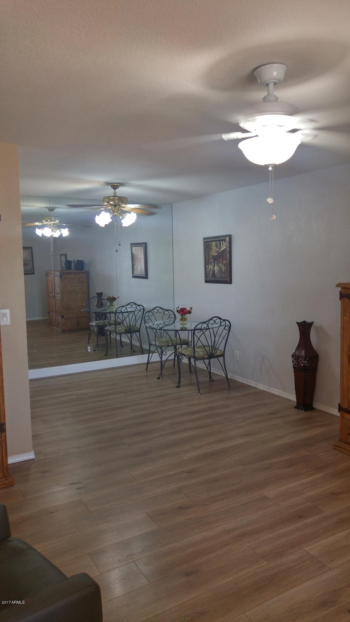 1340 North Recker Road, Unit 219 Mesa, AZ 85205 - Photo 16 of 41 a view of a room with gym equipment