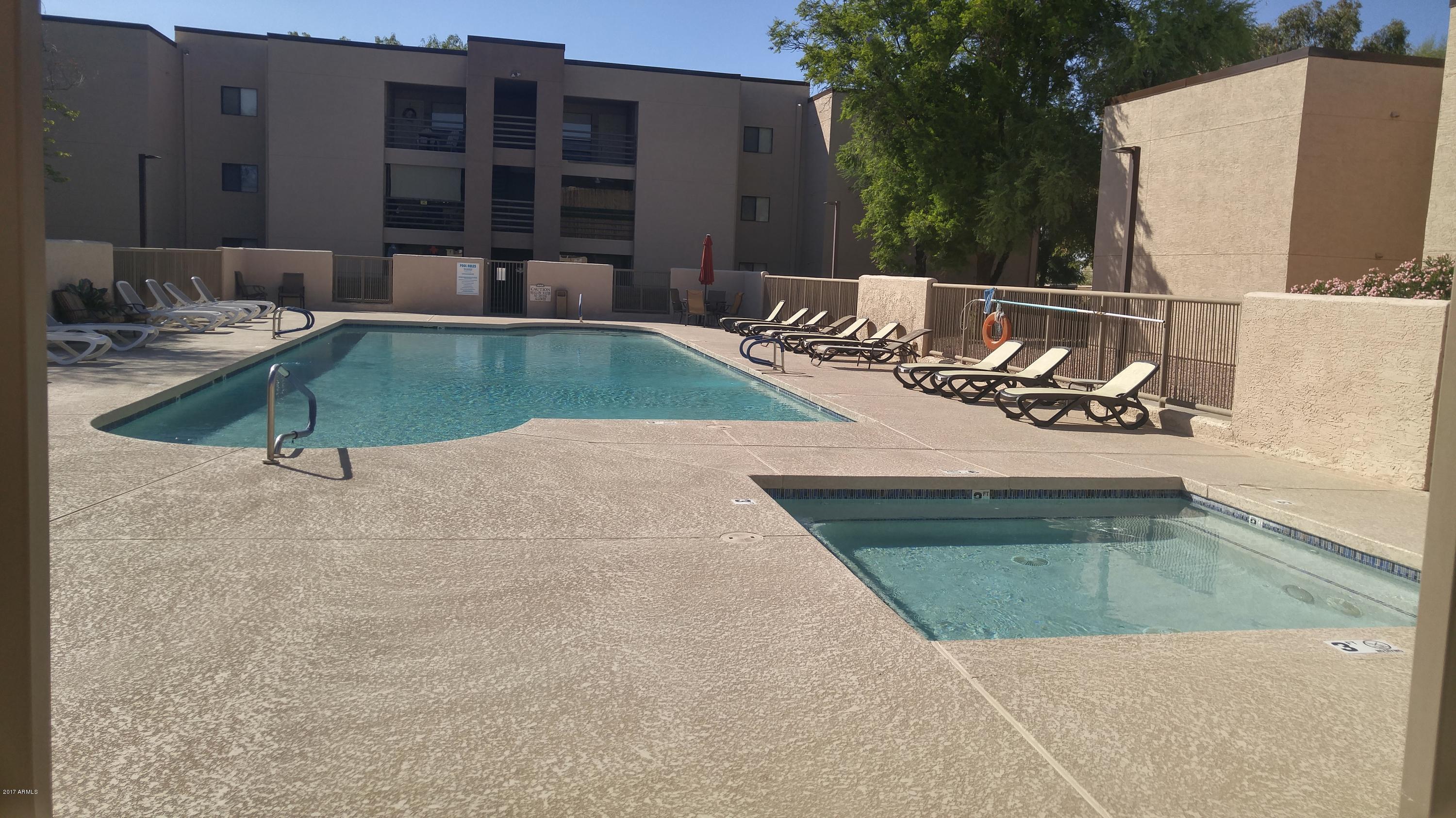 1340 North Recker Road, Unit 219 Mesa, AZ 85205 - Photo 4 of 41 swimming pool view with a outdoor seating