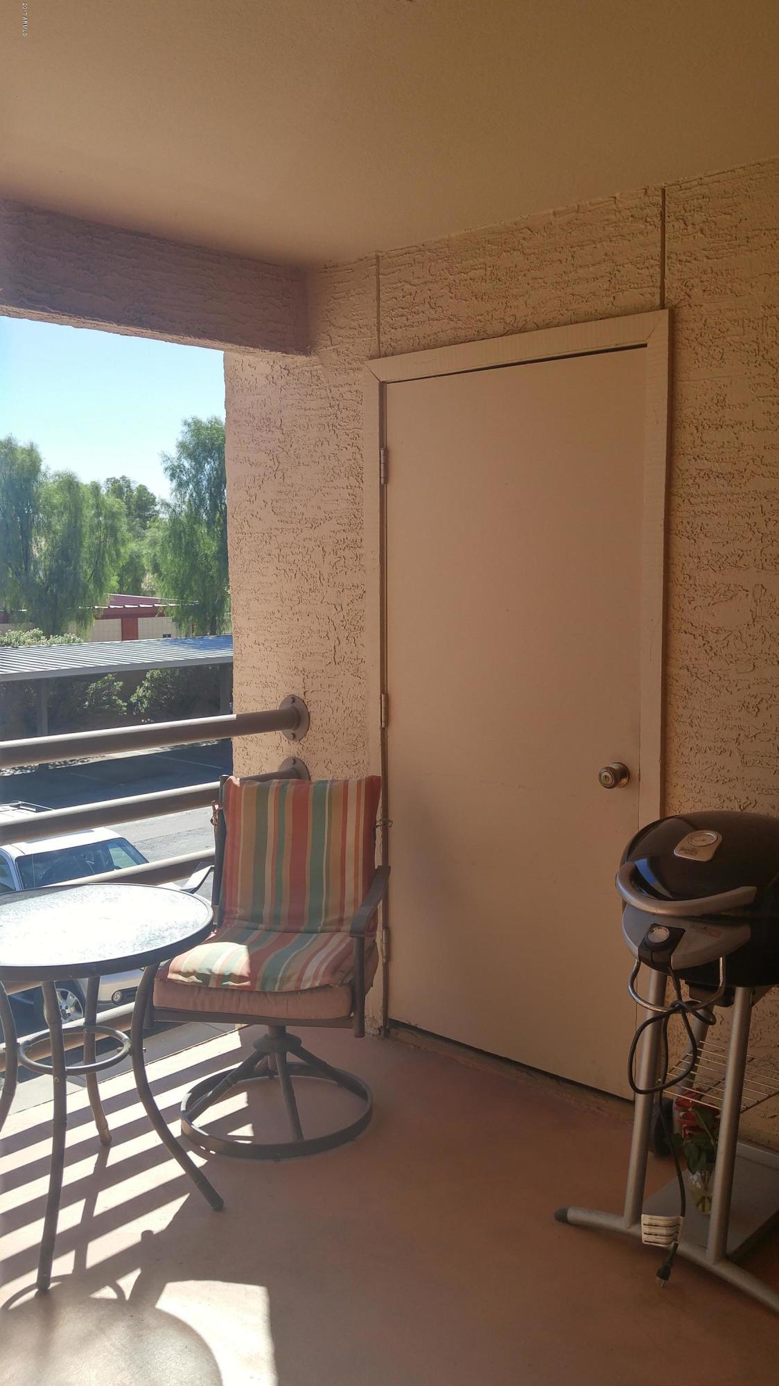 1340 North Recker Road, Unit 219 Mesa, AZ 85205 - Photo 9 of 41 a view of a room with gym equipment