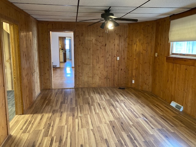 23424 West Coal City Road Wilmington, IL 60481 - Photo 11 of 15 a view of a room with wooden floor a ceiling fan and front door