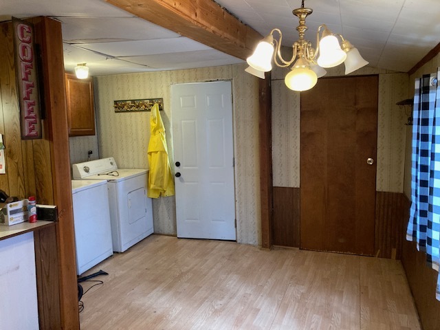 23424 West Coal City Road Wilmington, IL 60481 - Photo 6 of 15 a view of a bathroom with a mirror and a shower