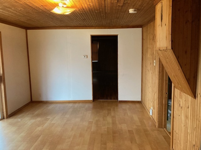23424 West Coal City Road Wilmington, IL 60481 - Photo 9 of 15 a view of an empty room with wooden floor