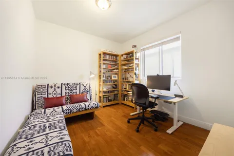 a workspace with furniture and rug