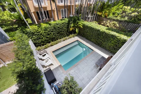 a view of a backyard with plants