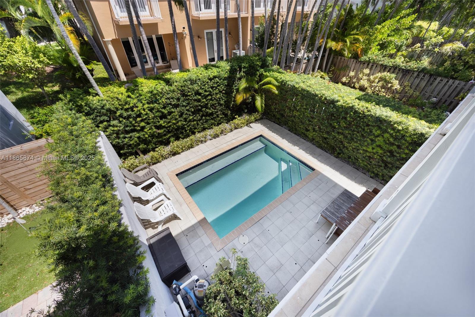 3109 Hibiscus Street, Unit 3109 Coconut Grove, FL 33133 - Photo 23 of 25 a view of a backyard with plants