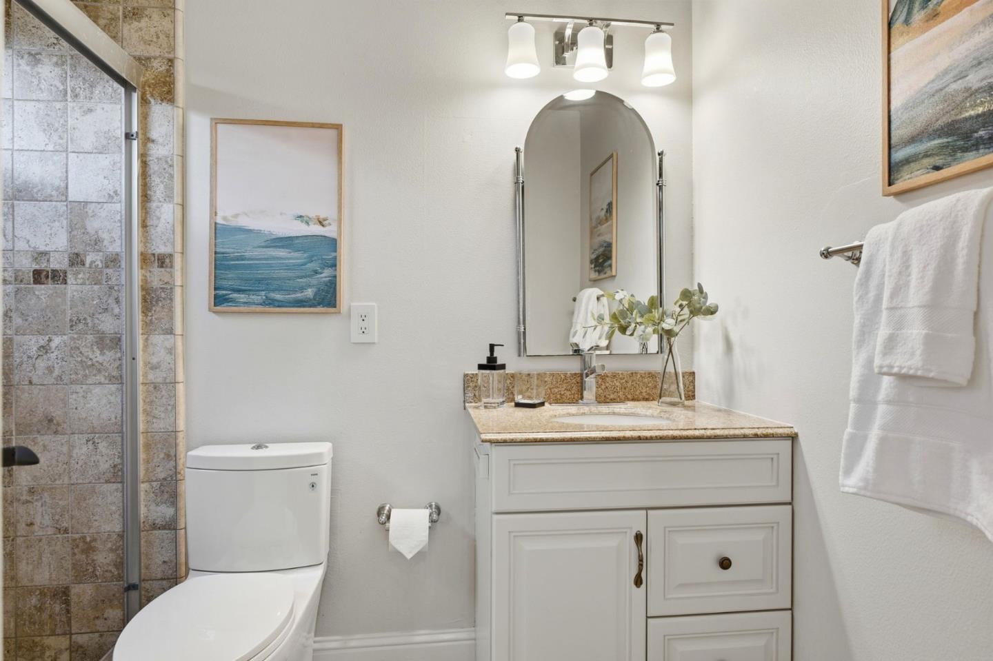 1663 Curtner Avenue San Jose, CA 95125 - Photo 31 of 57 a bathroom with a toilet sink and mirror