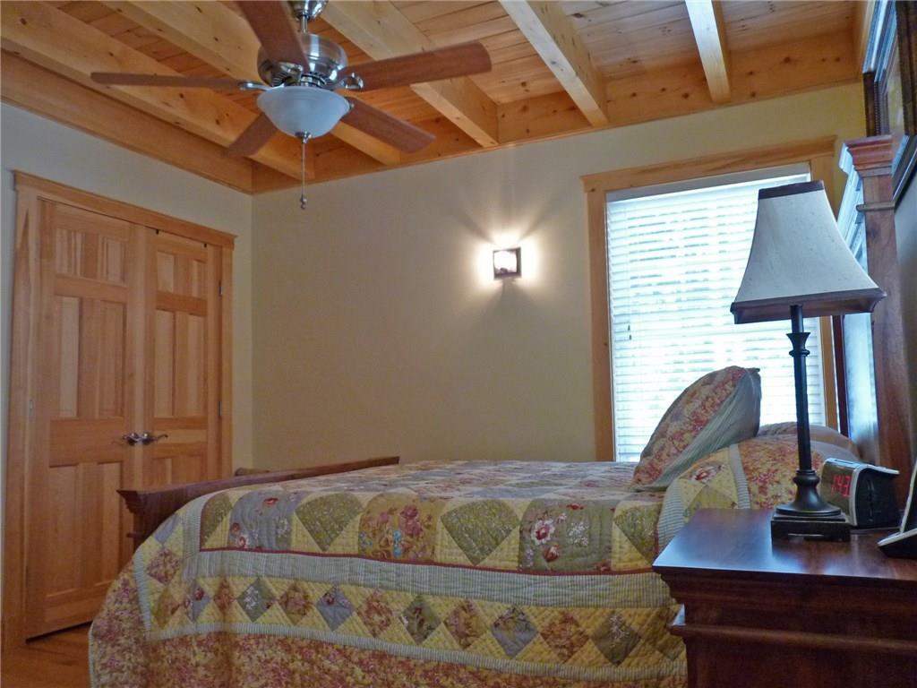 321 West Shore Road Ellsworth, ME 04605 - Photo 25 of 35 First floor master bedroom with wood...