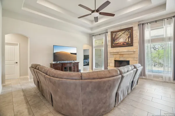 a view of a dining room with furniture wooden floor and chandelier