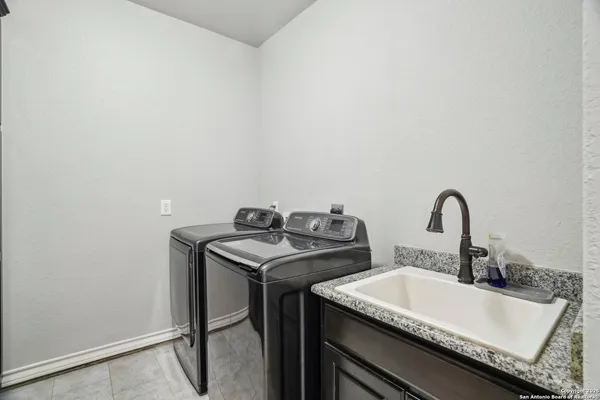 a swimming pool with outdoor seating and yard