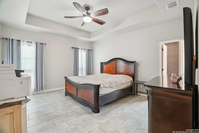 a view of a house with a garden and yard